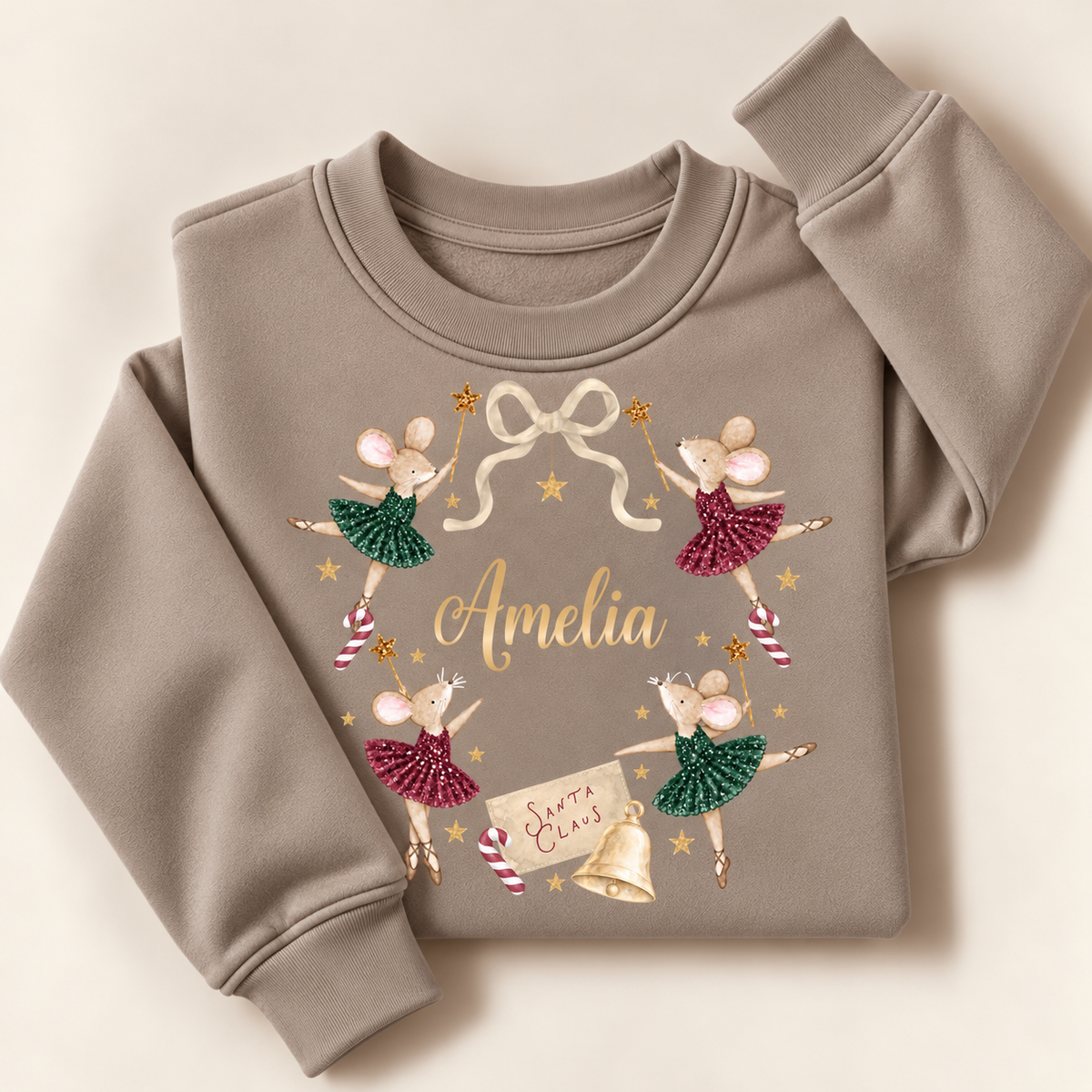 Personalised mink Christmas sweatshirt with ballerina mice in red and green tutus, gold stars and candy canes, laid flat | Grace & Grayson