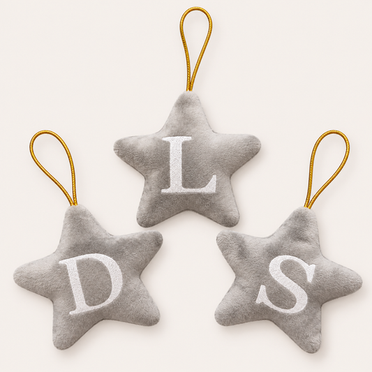 Three grey personalised initial Christmas star tree decorations with white lettering, displayed together, Grace & Grayson
