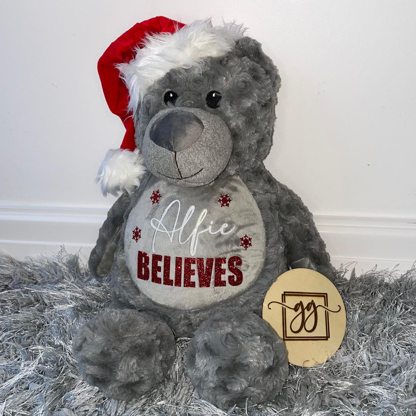 Personalised Bold Name Believes Christmas Teddy Bear