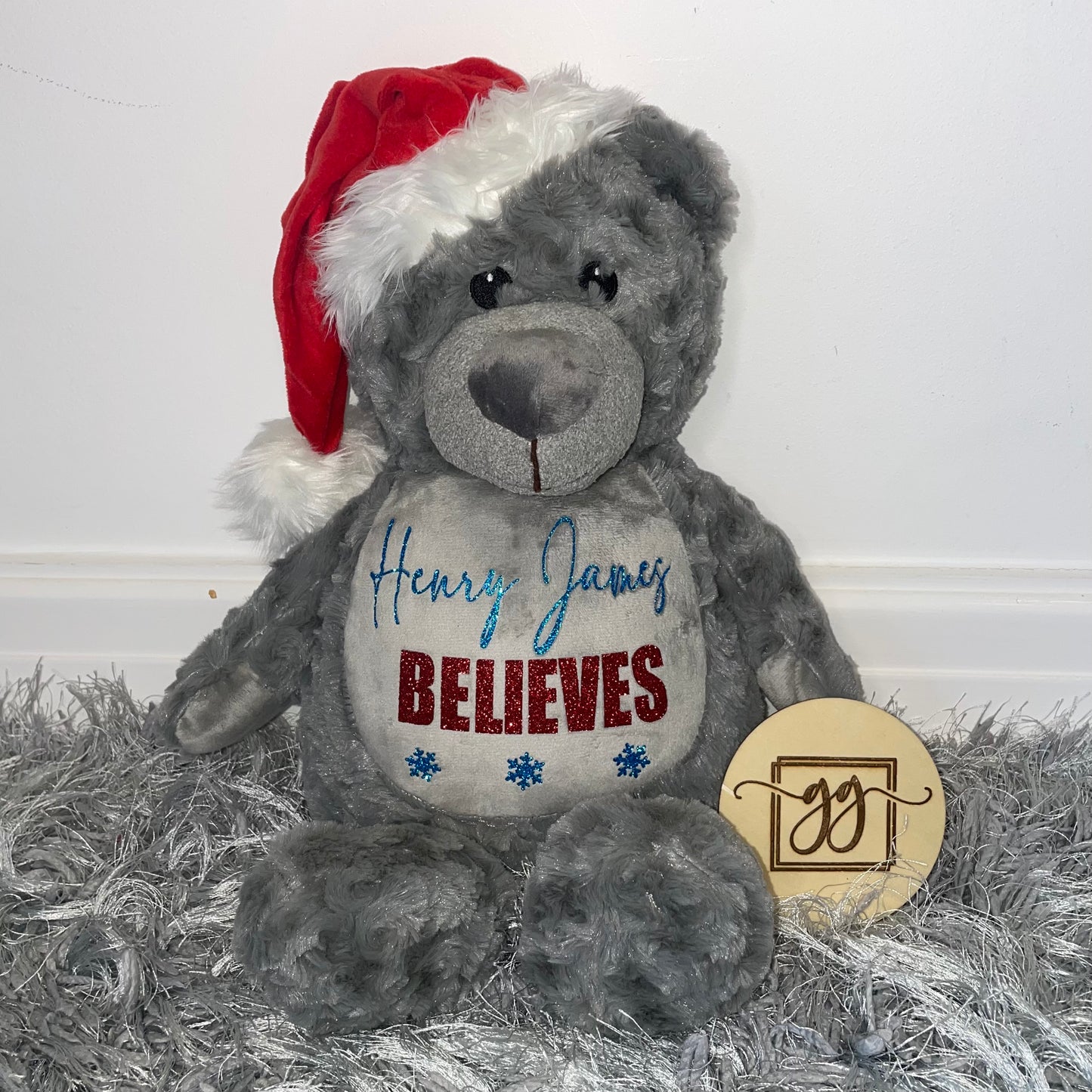 Personalised Bold Name Believes Christmas Teddy Bear